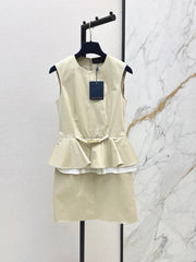 Sleeveless dress with a "faux-layered" design