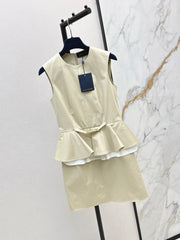 Sleeveless dress with a "faux-layered" design