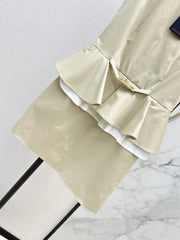Sleeveless dress with a "faux-layered" design