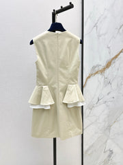 Sleeveless dress with a "faux-layered" design