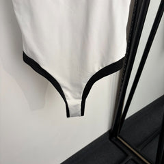 Black and white color-block halter one-piece swimsuit