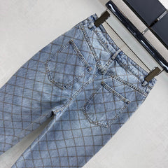 Quilted Denim Trousers with Chain Detail