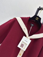 Color-block knit cardigan featuring a nautical-style collar