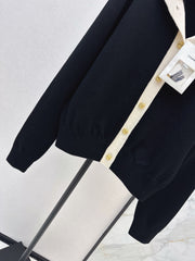 Color-block knit cardigan featuring a nautical-style collar