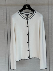 Color-block knit cardigan featuring a nautical-style collar