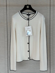 Color-block knit cardigan featuring a nautical-style collar