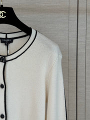 Color-block knit cardigan featuring a nautical-style collar