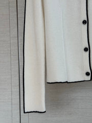 Color-block knit cardigan featuring a nautical-style collar