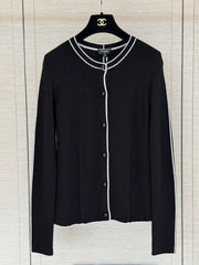 Color-block knit cardigan featuring a nautical-style collar