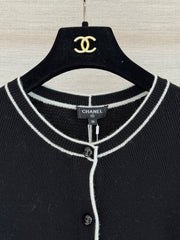 Color-block knit cardigan featuring a nautical-style collar