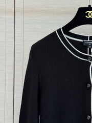 Color-block knit cardigan featuring a nautical-style collar