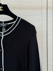 Color-block knit cardigan featuring a nautical-style collar
