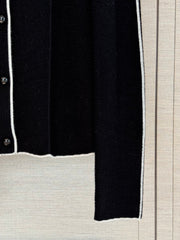 Color-block knit cardigan featuring a nautical-style collar