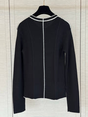 Color-block knit cardigan featuring a nautical-style collar