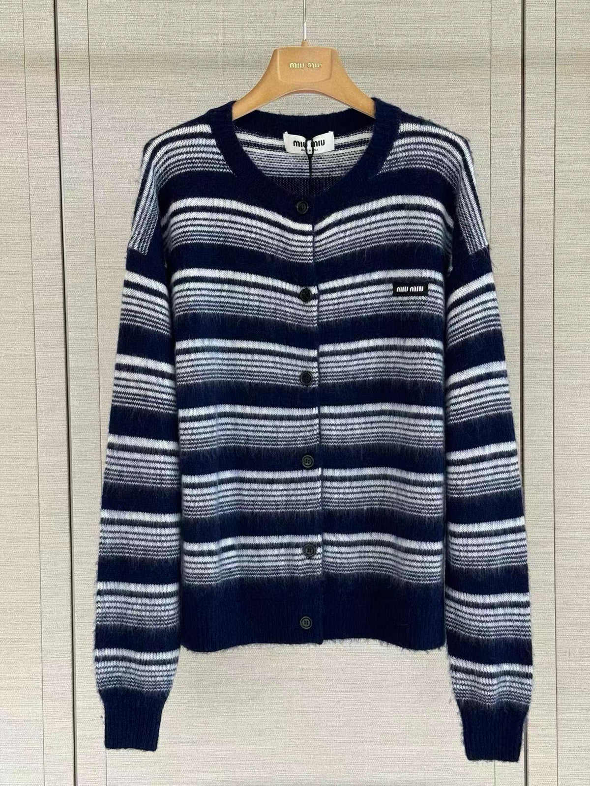 Navy and white horizontal-striped knit cardigan