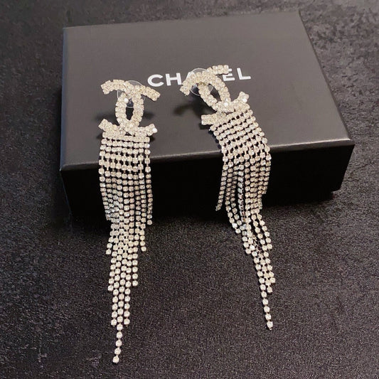 Long, fully paved rhinestone tassel earrings