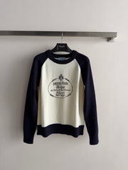 Color-blocked raglan-sleeve crew-neck knit top