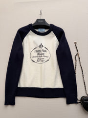 Color-blocked raglan-sleeve crew-neck knit top