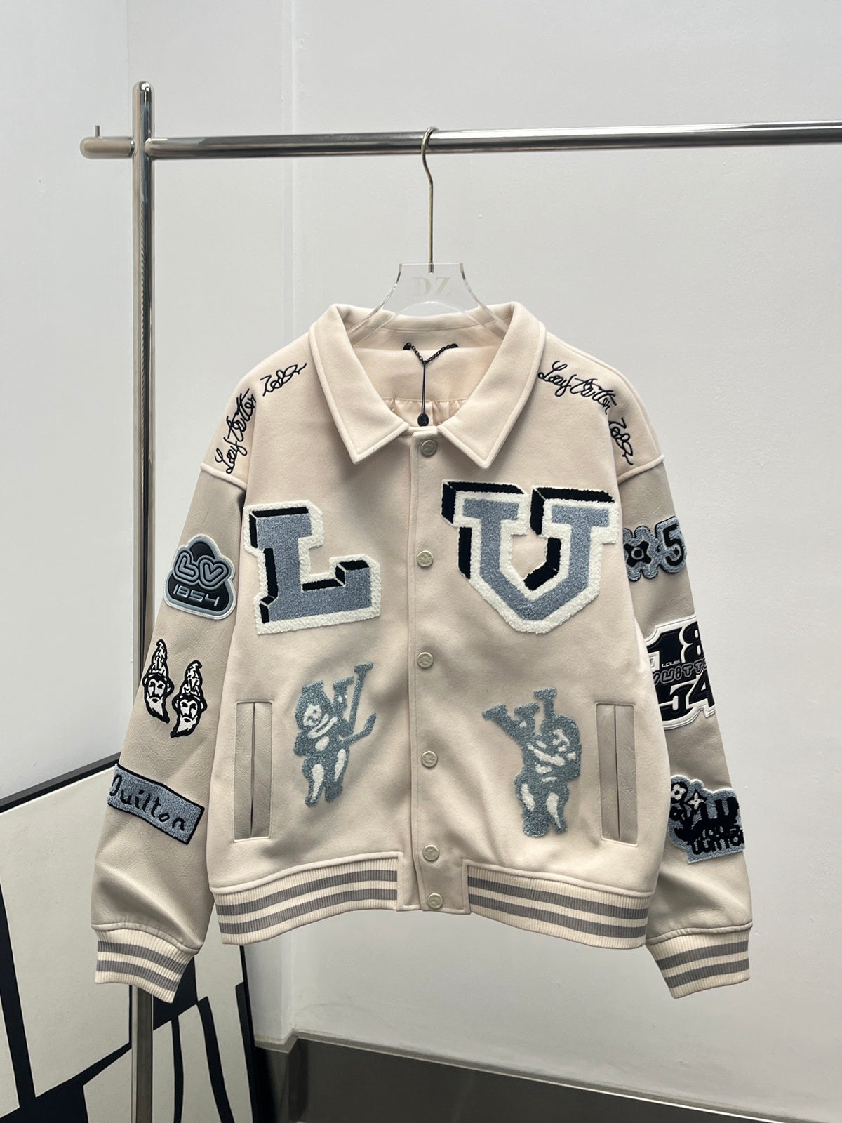 Playful cartoon baseball jacket.