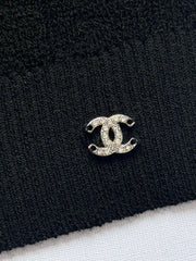 Knot-patterned long-sleeved knit sweater