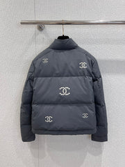 Hollowed-out, seam-sealed short down jacket