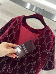 Red dress with rhinestone lettering
