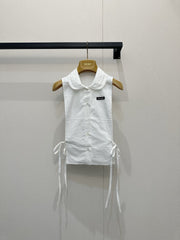 Embroidered sleeveless tie-front vest
