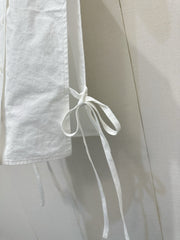Embroidered sleeveless tie-front vest