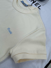 Pale yellow ribbed crew neck short-sleeved shirt