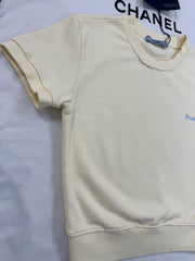 Pale yellow ribbed crew neck short-sleeved shirt