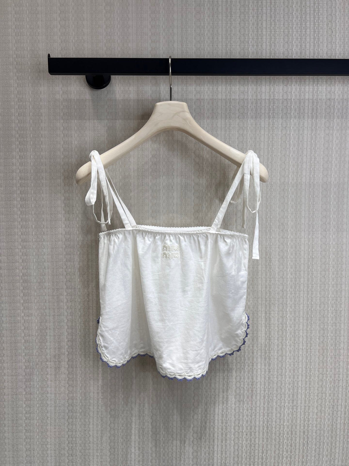 Off-white lace-trimmed vacation-style camisole