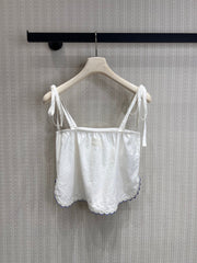 Off-white lace-trimmed vacation-style camisole