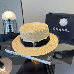 Straw hat with a bow