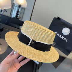 Straw hat with a bow