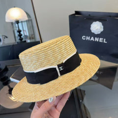 Straw hat with a bow