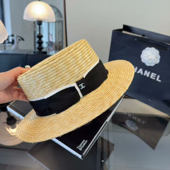 Straw hat with a bow