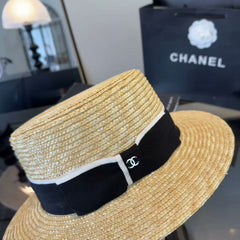 Straw hat with a bow