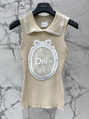 Open-knit vest with a Peter Pan collar