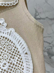 Open-knit vest with a Peter Pan collar
