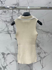 Open-knit vest with a Peter Pan collar