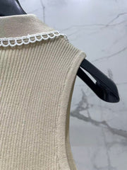 Open-knit vest with a Peter Pan collar