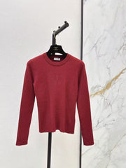 Solid-color long-sleeve knit top