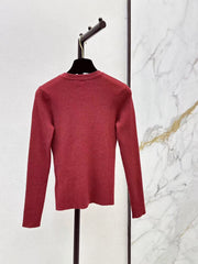 Solid-color long-sleeve knit top