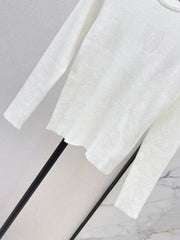 Solid-color long-sleeve knit top